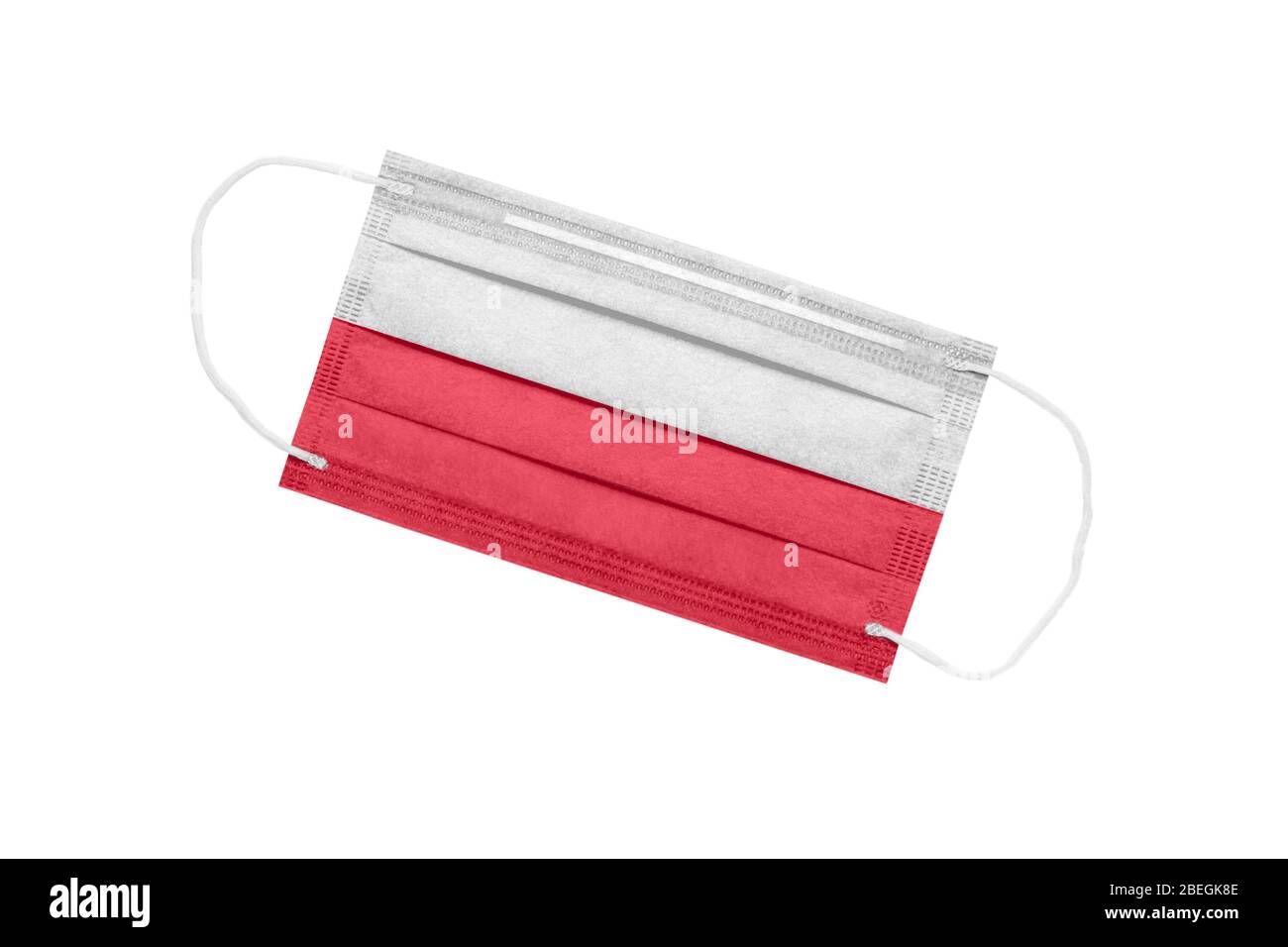 Medizinische Gesichtsmaske mit Flagge von polen isoliert auf weißem Hintergrund. Polen Pandemie Konzept. Attribut des Coronavirus Ausbruch in Polen. Medizin in Stockfoto