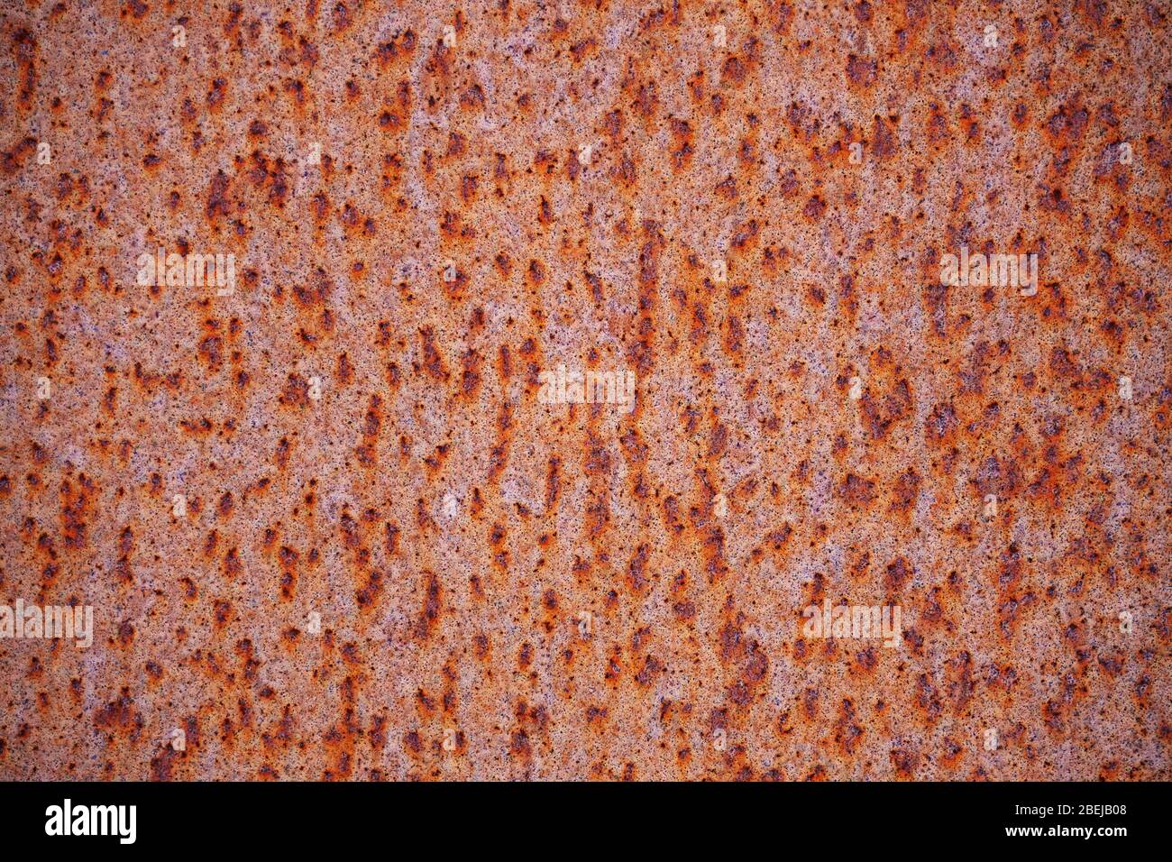 Rostiger Hintergrund korrodierte Metallstruktur mit Rostfleck-Muster Stockfoto