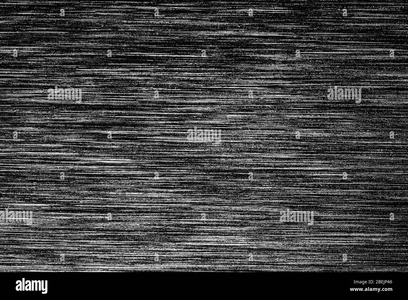 Schwarze Metallstruktur mit weißen Kratzern. Abstraktes Noise Black Hintergrund Overlay für Design. Stilisierte Kunst Baner. Stockfoto