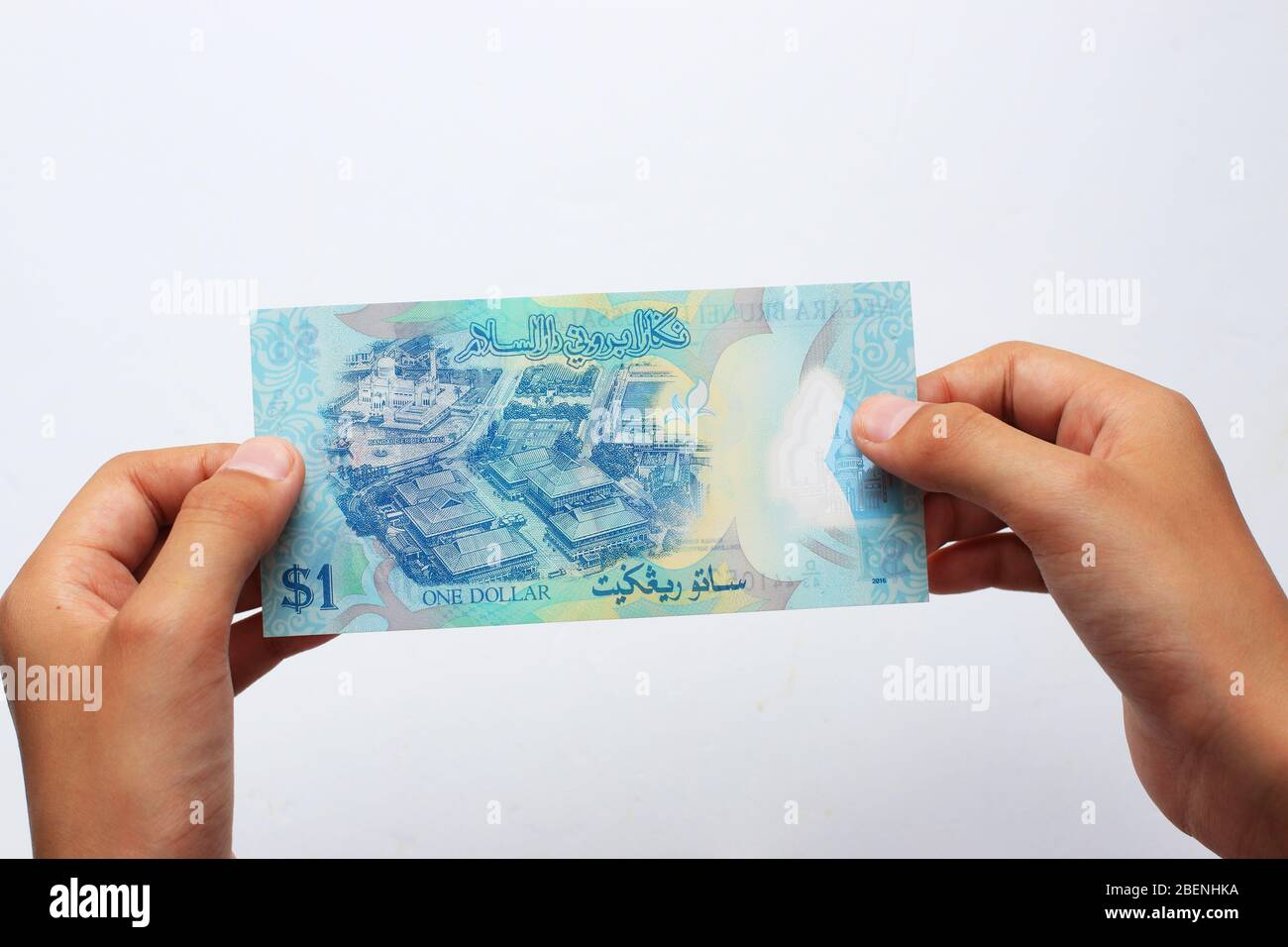 1.00 USD, eine Brunei-Dollar-Währung vor weißem Hintergrund Stockfoto