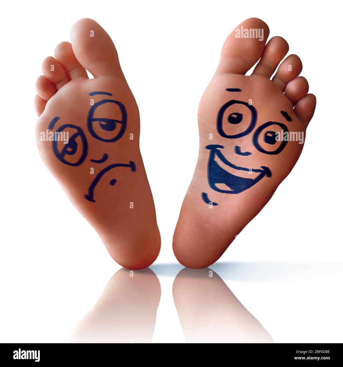 Happy Foot und trauriger Fuß isoliert in weißem Hintergrund Stockfoto