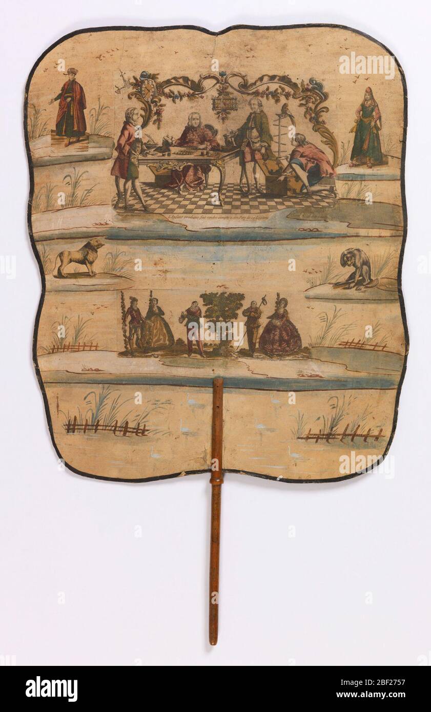 Brandschutzscheibe. Großer, handgehaltener Feuerschutz auf einem Holzstab. Stockfoto