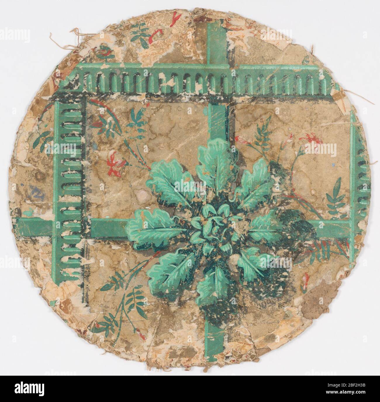 Bandbox. Bandbox Lid Fragment. Runder Deckel, große Rosette und Band, grün bedruckt, mit floralen und blättrigen Spigs, auf cremeweißem Grund. Stockfoto