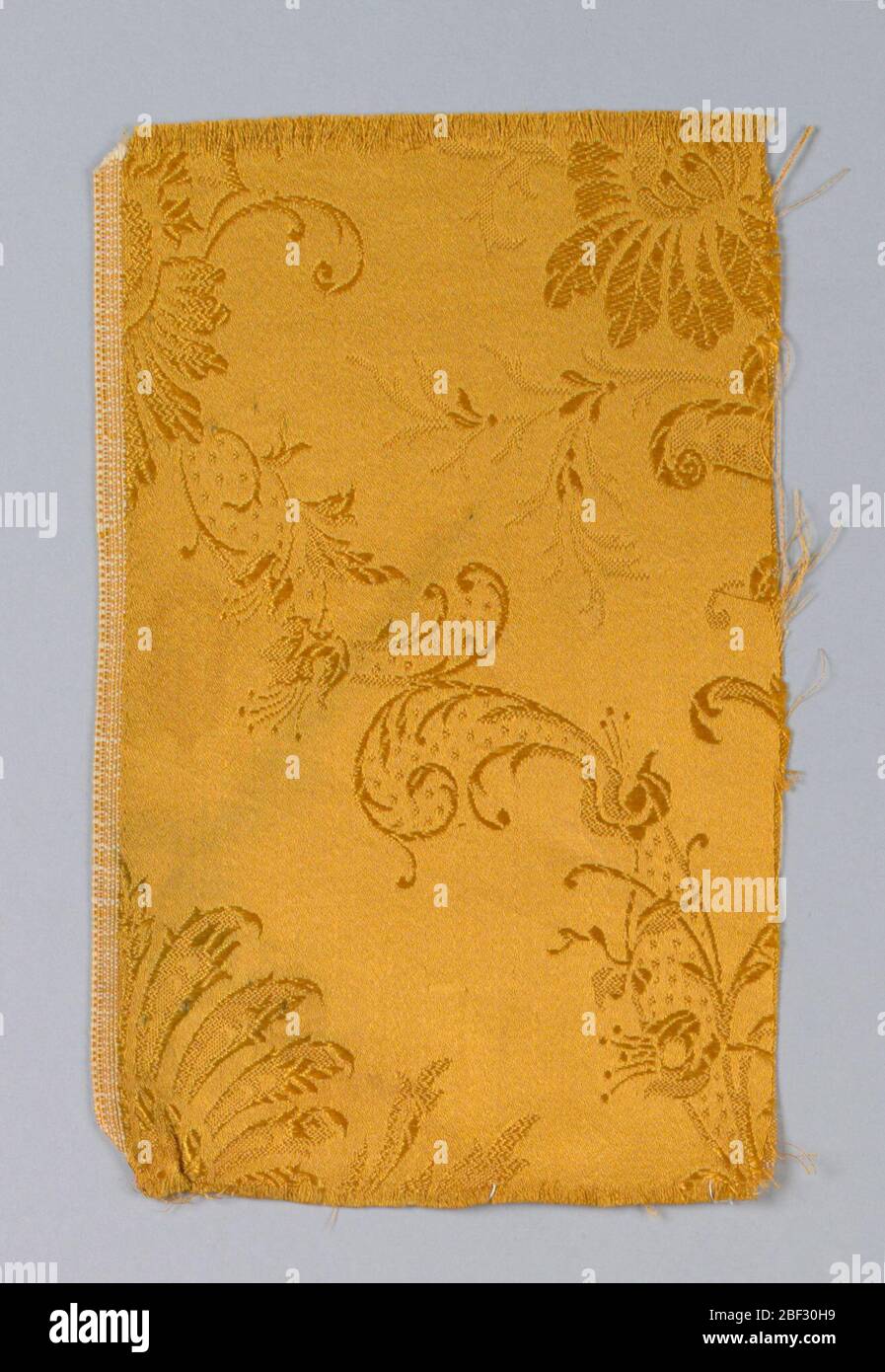 Beispiele. a. Olivgrüner Boden mit hellgrünem Muster.B. Olivgrün auf Olivgrün.c. Goldfarbe auf Goldfarbe. Stockfoto