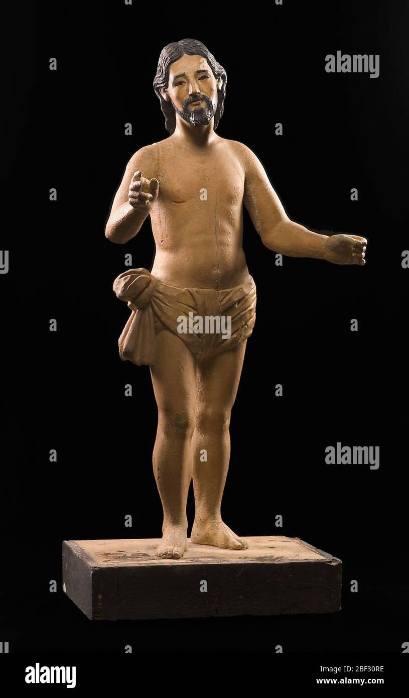 Cristo. In einer Museumsinstallation, hinter Glas, sind diese religiösen Figuren und santos nicht so physisch zugänglich wie für Gläubige in ihren Kirchen oder Hausaltären. Stockfoto