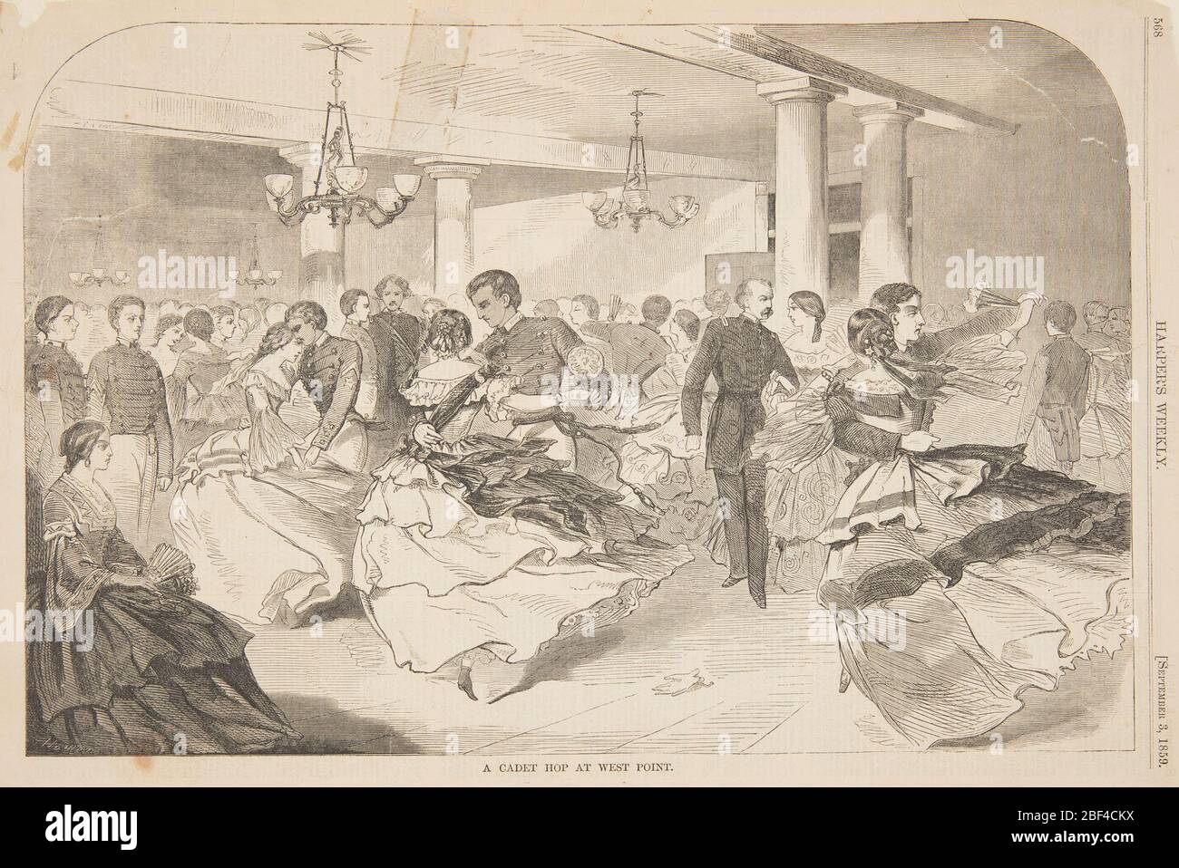 Ein Cadet Hop am West Point. Paare tanzen eine Polka an einem großen Ball. Die Männer sind in Uniform. Stockfoto