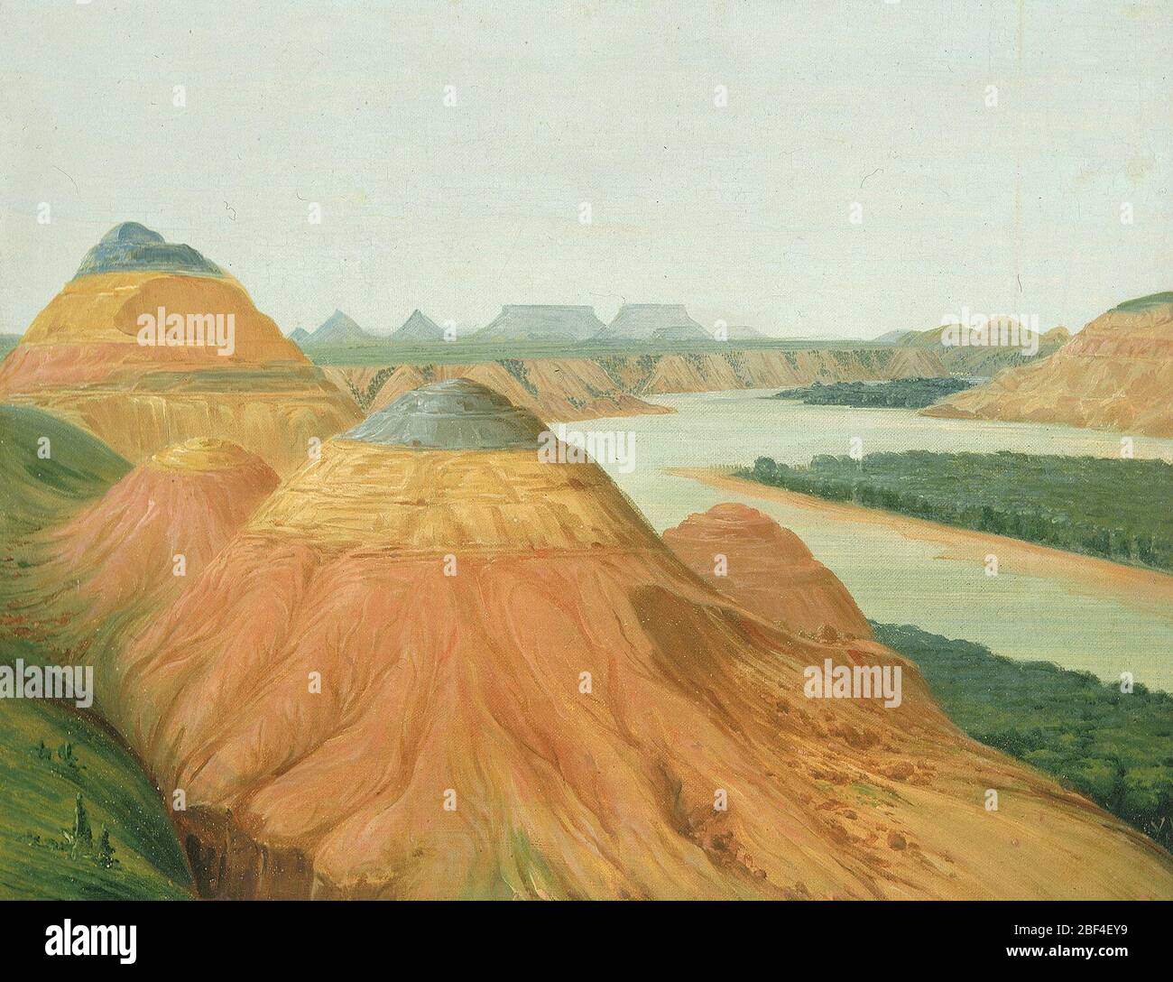 Blick in die Big Bend des Upper Missouri. George Catlin malte diese Landschaft 1832, während einer langen Reise auf dem Missouri River. Er beschrieb die Szene als „prächtige Tonklippen, mit hohem Tafelland in der Ferne“. (Catlin, Katalog 1848, Catlin’s Indian Gallery, SAAM Online-Ausstellung) Stockfoto