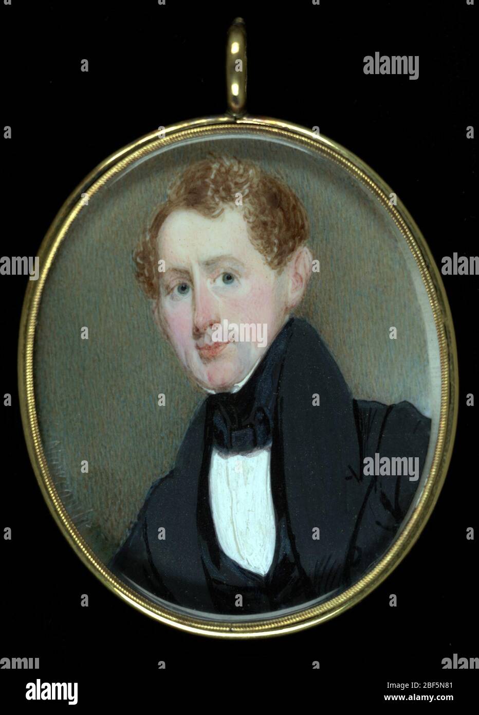 Porträt eines Gentleman. Laut einer Inschrift auf der Rückseite dieser Miniatur wurde dieses Werk gemalt, während George Newcombe am Broadway in New York City lebte. Der Herr trägt einen modisch hohen Kragen Mantel und schwarze Cravat, die Kontrast zu seiner Haar- und Hautfarbe. Stockfoto