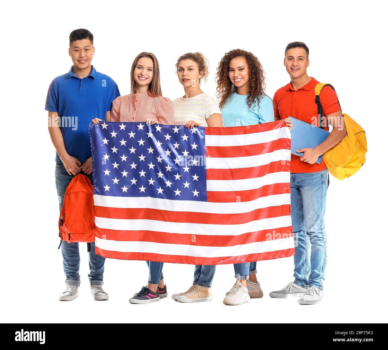 Junge Schüler der Sprachschule mit USA Flagge auf weißem Hintergrund Stockfoto