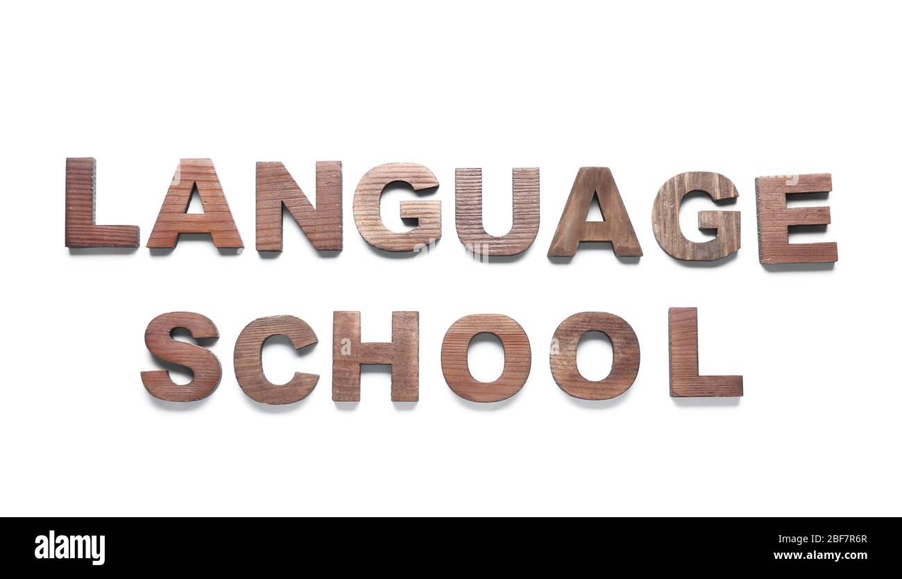 Text SPRACHSCHULE auf weißem Hintergrund Stockfoto