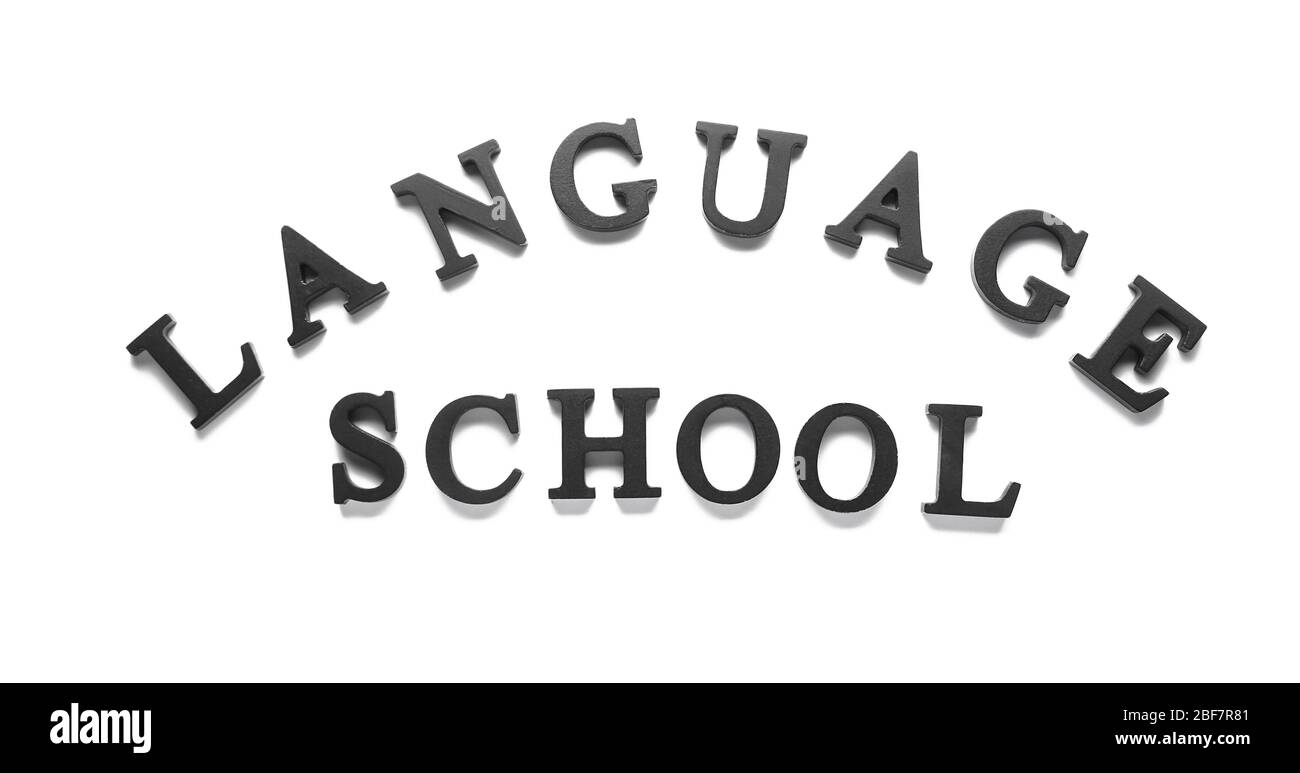 Text SPRACHSCHULE auf weißem Hintergrund Stockfoto