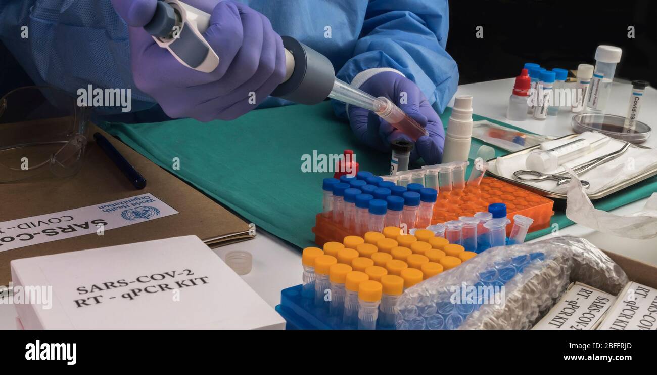 Wissenschaftler untersucht medizinische Behandlung für Covid-19 Coronavirus im Krankenhaus, Spanien Stockfoto