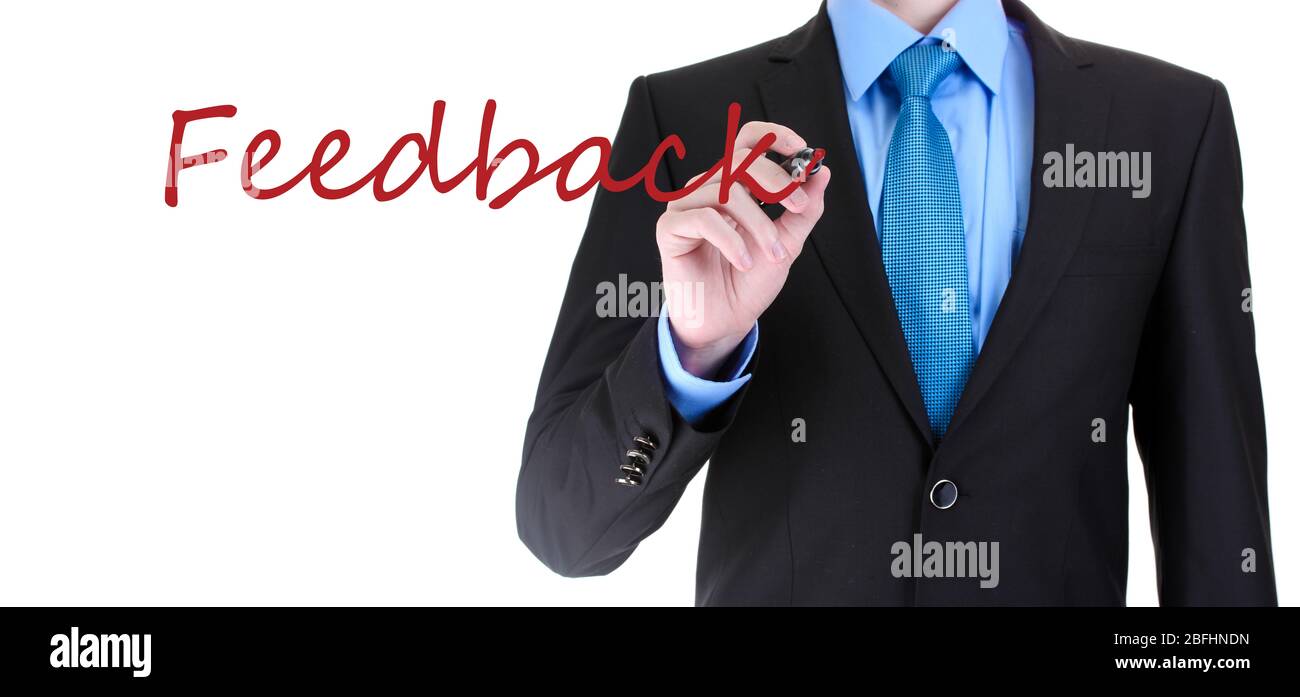 Geschäftsmann Schreiben Wort Feedback auf transparentem Brett Stockfoto