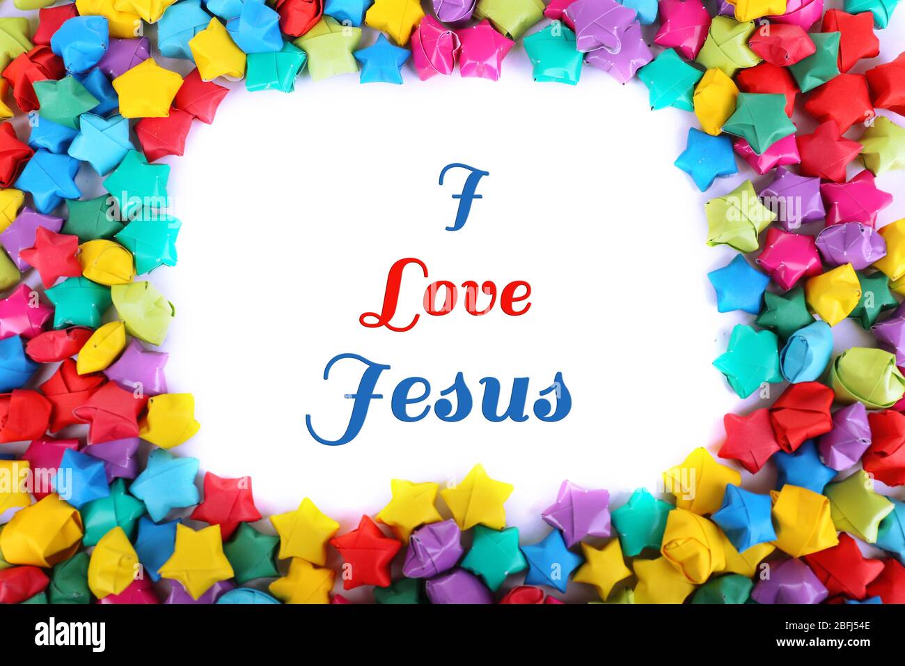 Ich liebe Jesus Text in Papier Sterne Rahmen Stockfoto