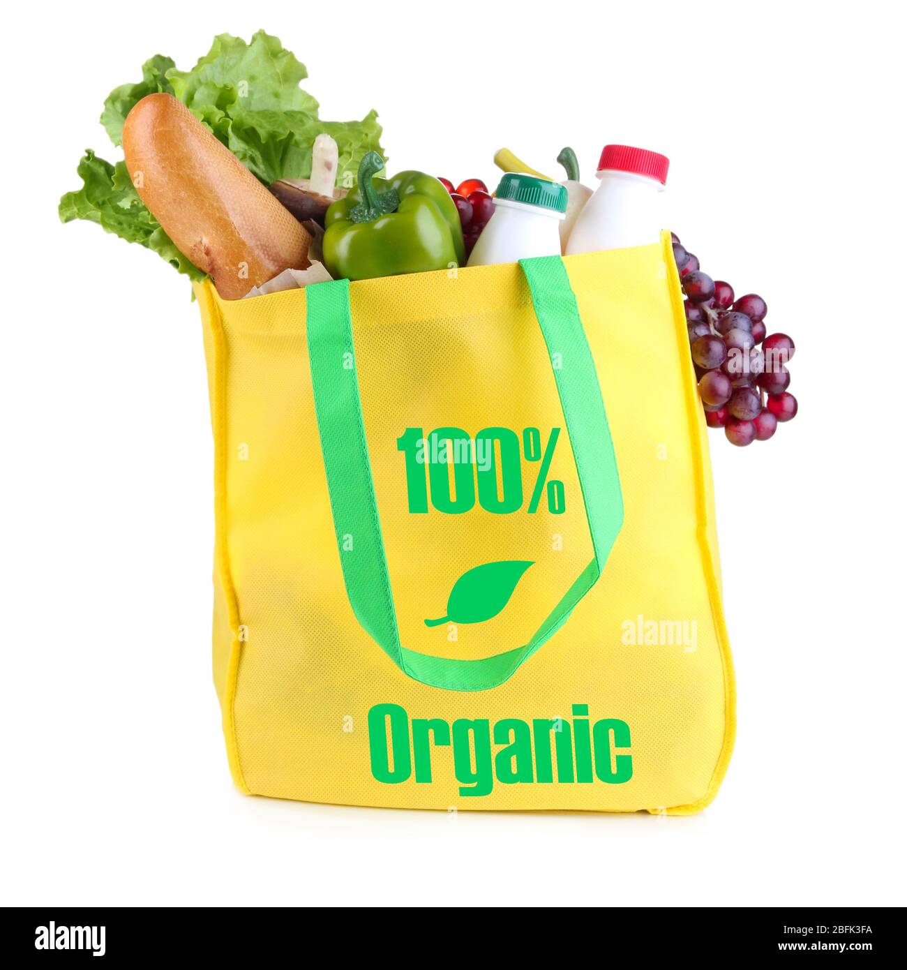 Gelbe Tasche mit Bio-Produkten auf weiß isoliert Stockfoto