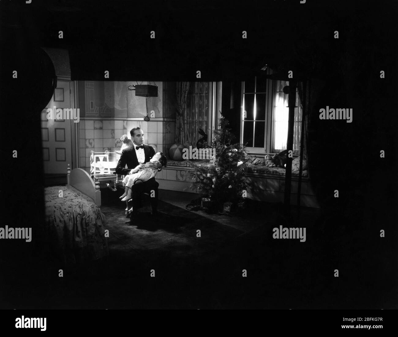 AL JOLSON singt das Lied '' Sonny Boy '' an DAVEY LEE am Set offen Dreharbeiten DER SINGENDE NARR 1928 Regisseur LLOYD BACON die Vitaphone Corporation - Warner Bros. Stockfoto