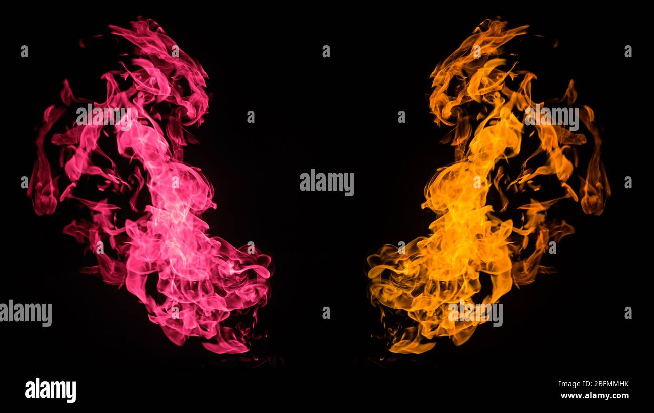 Farbiges Feuer auf schwarzem Hintergrund. Flammende Muster und abstrakter Rauch. Konzept, Idee, Projekt. Stockfoto
