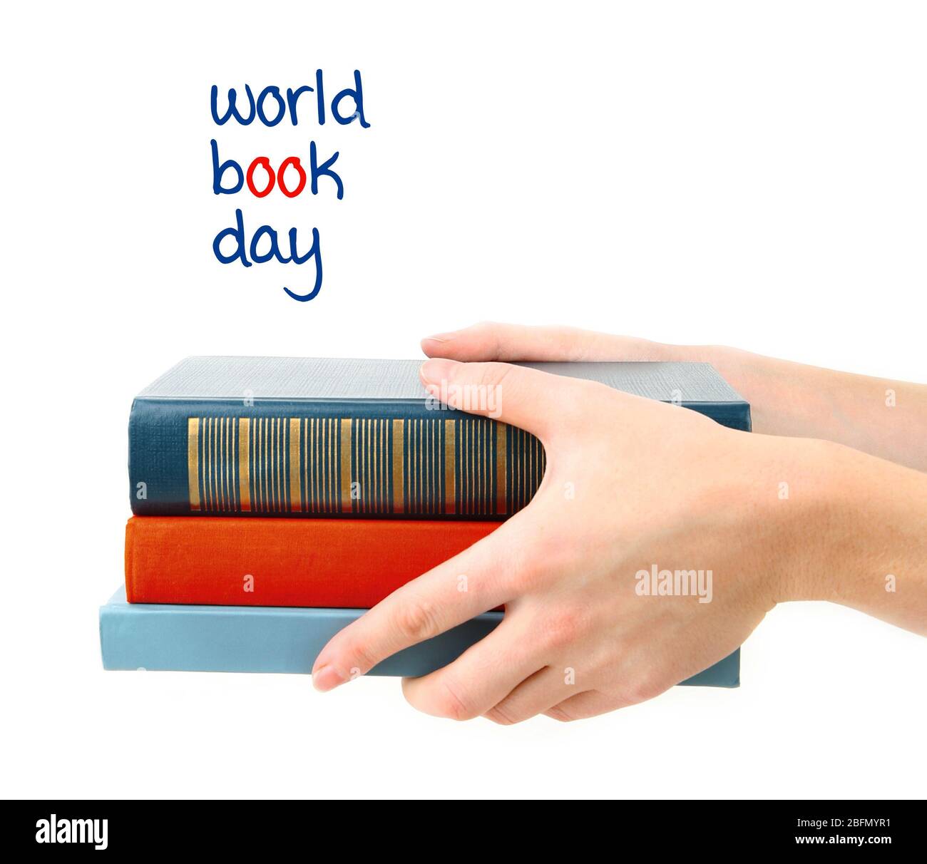 Bücher in Händen und World Book Day Text isoliert auf weiß Stockfoto