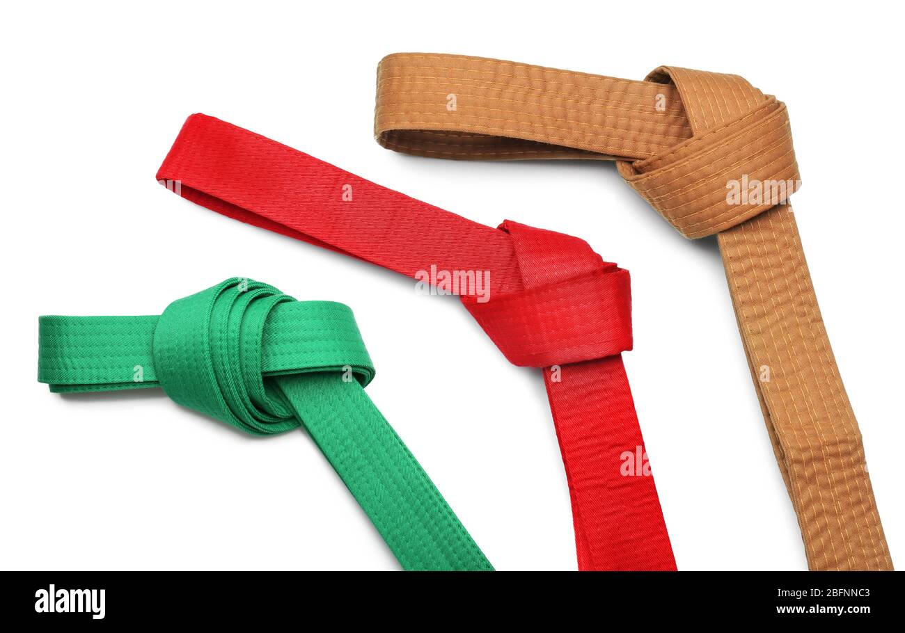 Set Karate Gürtel auf weißem Hintergrund Stockfoto