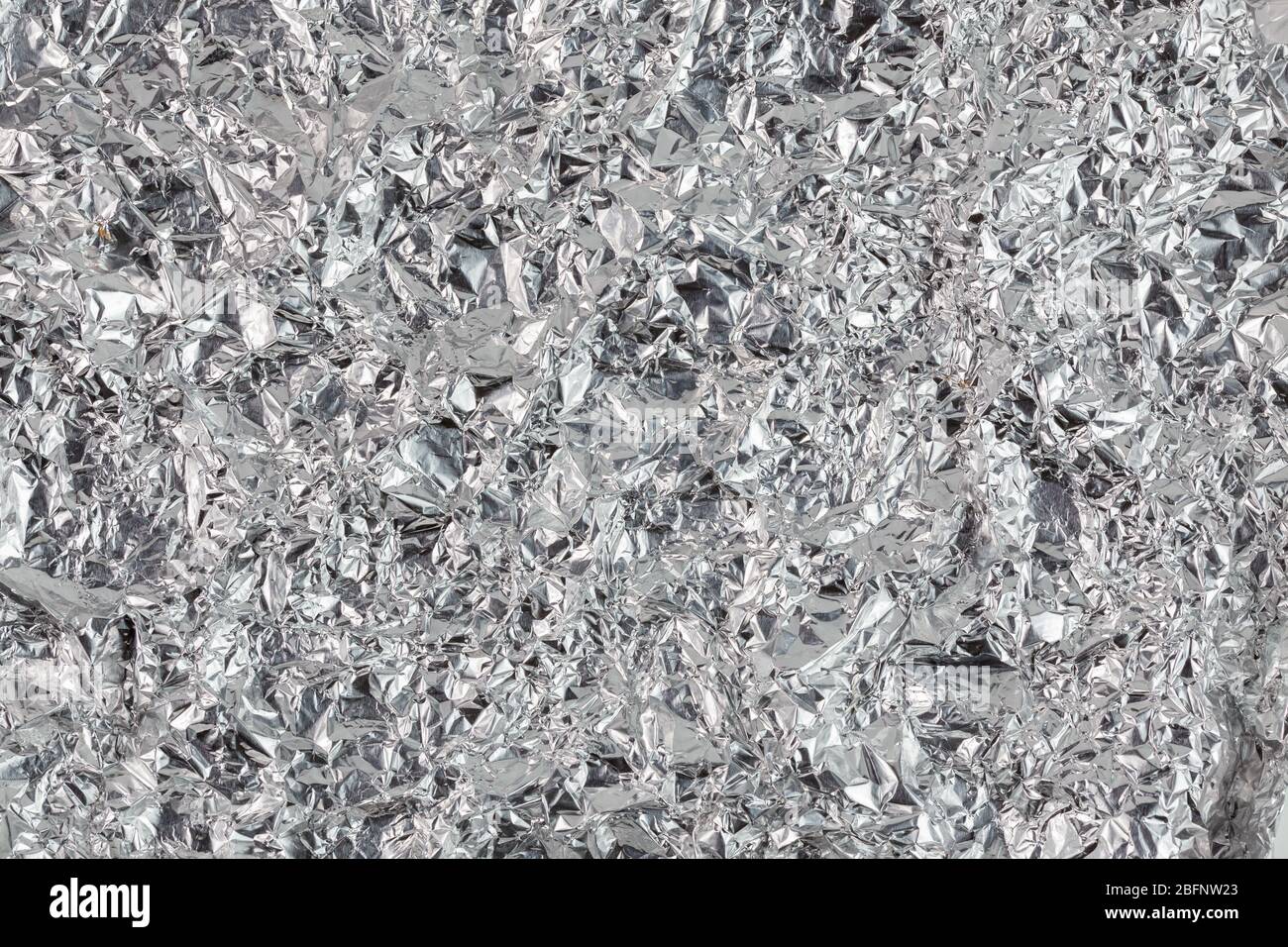 Zerknitterte Aluminiumfolie flacher Hintergrund und Textur Stockfoto