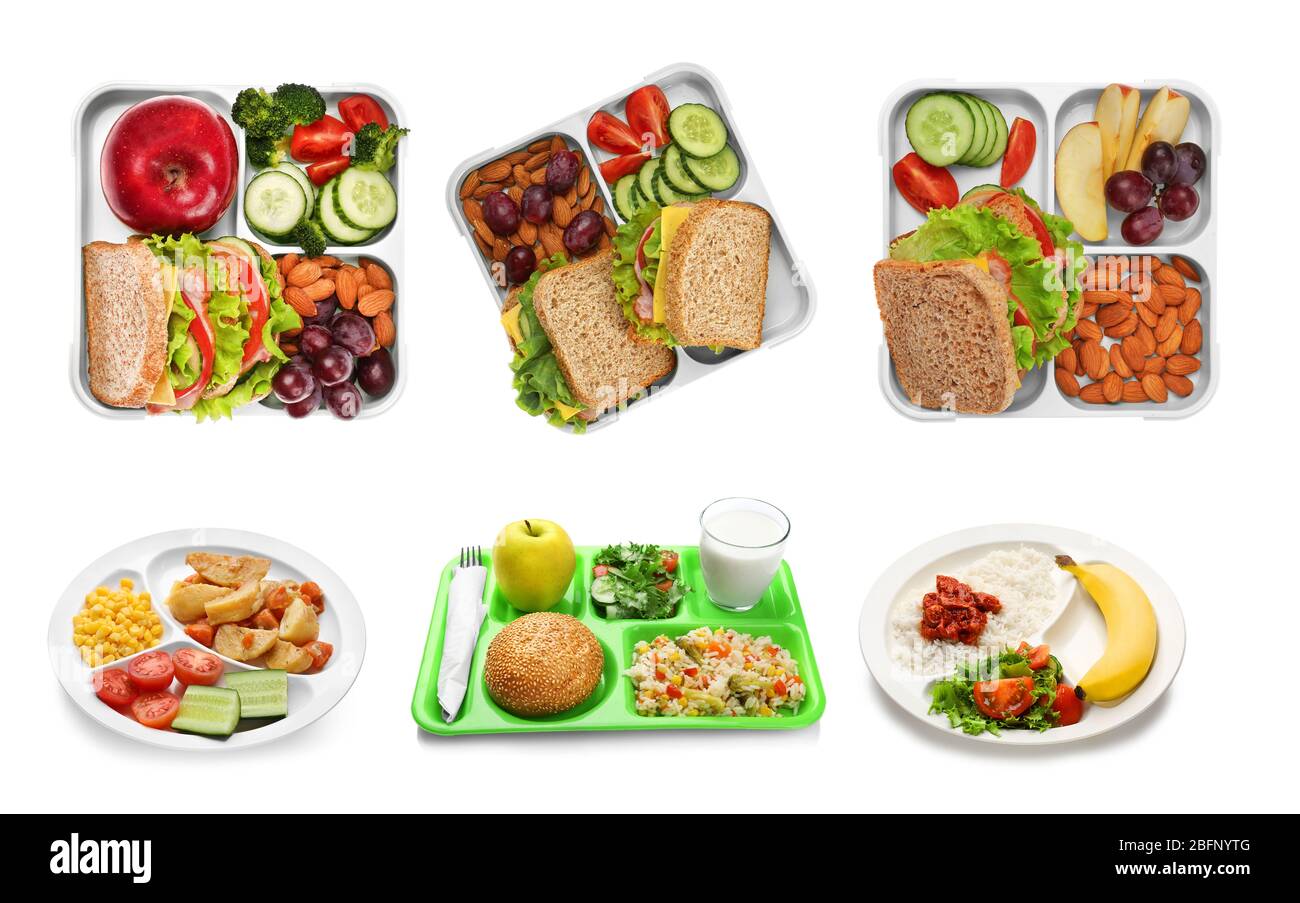 Set von Serviertabletts mit Essen für Schulessen auf weißem Hintergrund Stockfoto