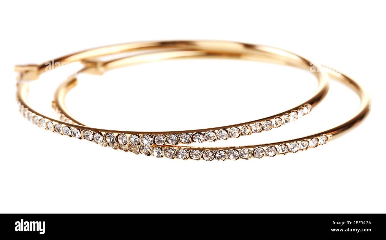 Schöne goldene Ohrringe mit Diamant isoliert auf weiß Stockfoto