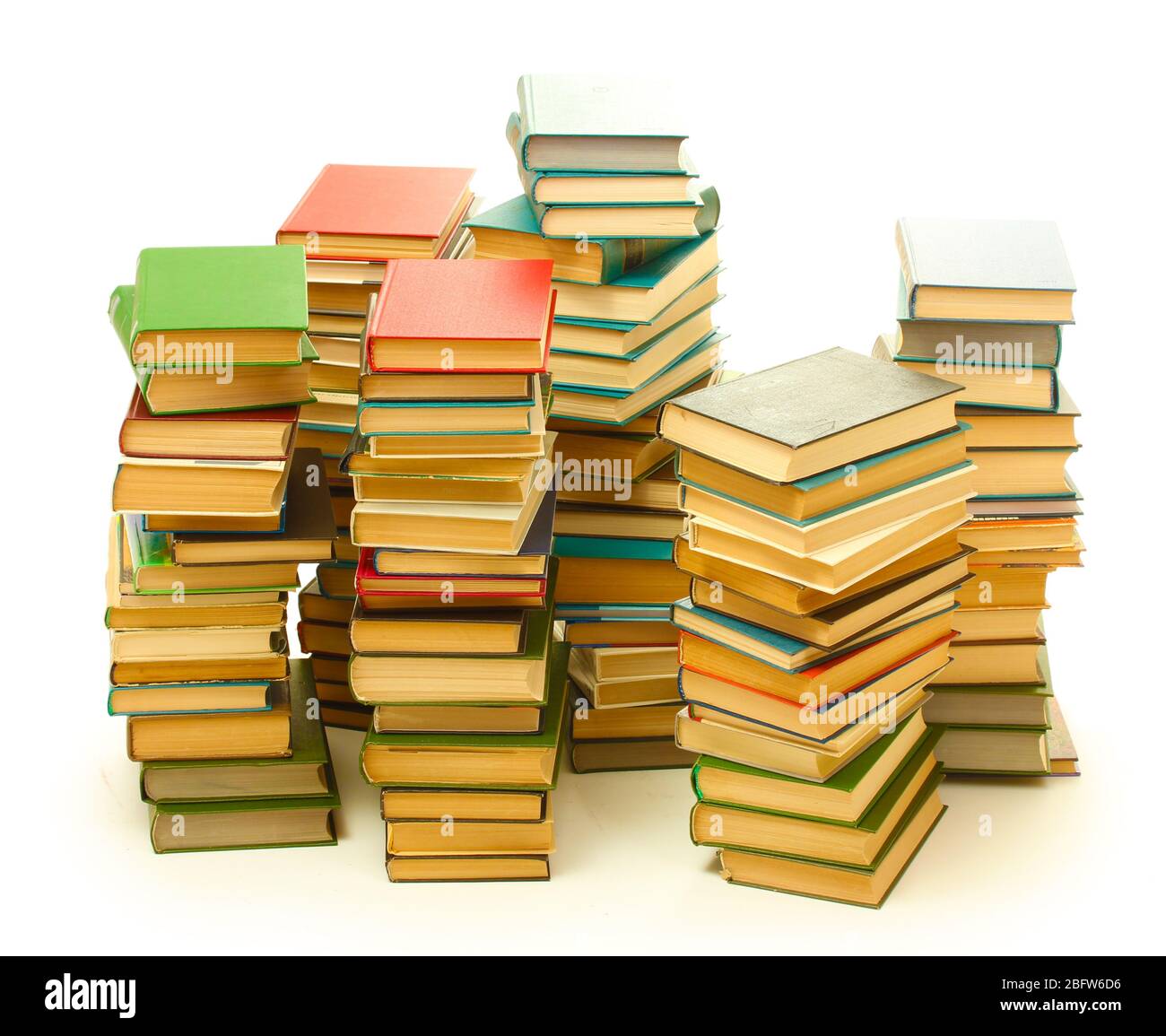 Alte Bücher isoliert auf weißem Stockfoto