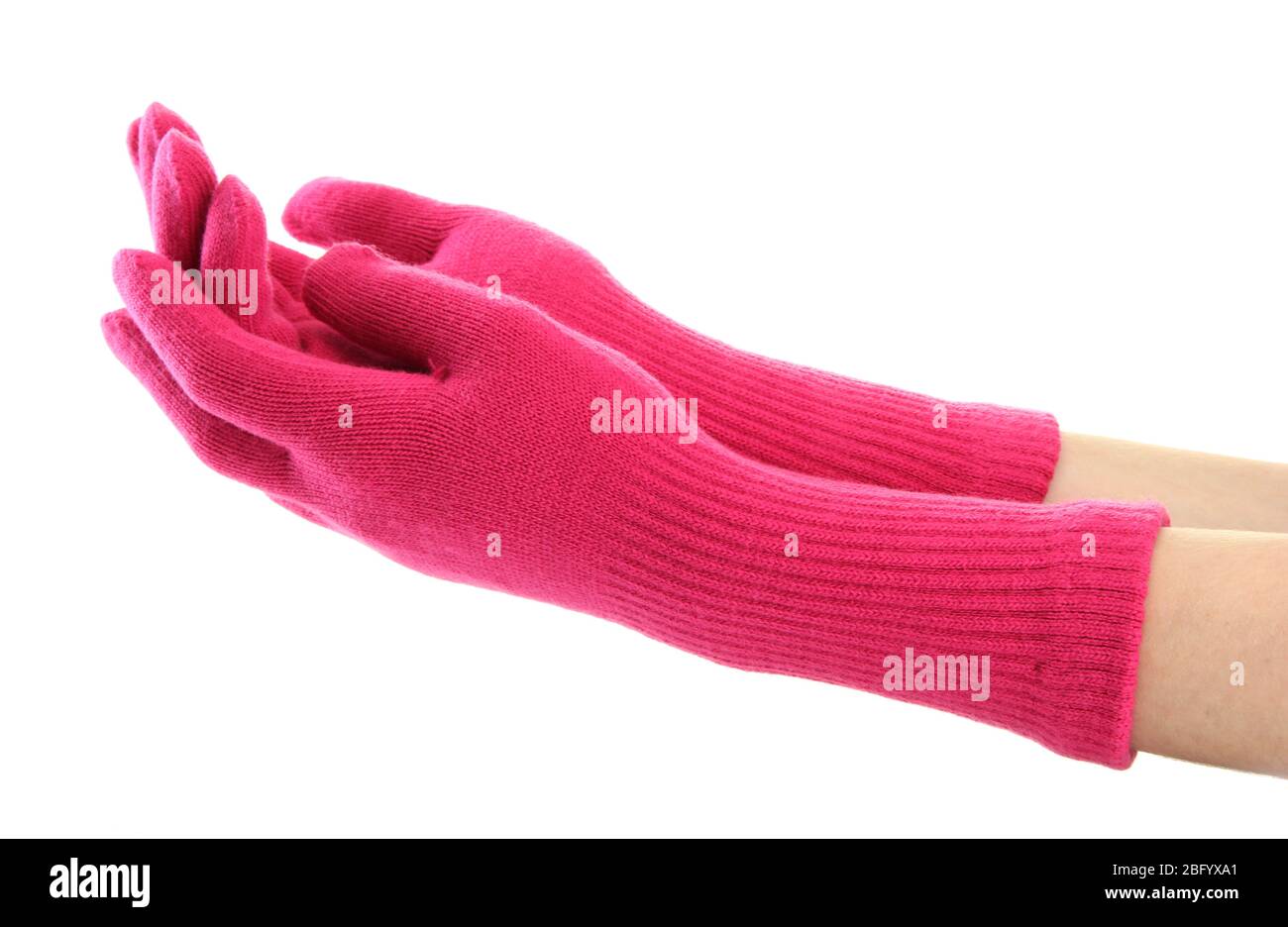 Frau gestrickte Handschuhe an den Händen, isoliert auf weiß Stockfoto