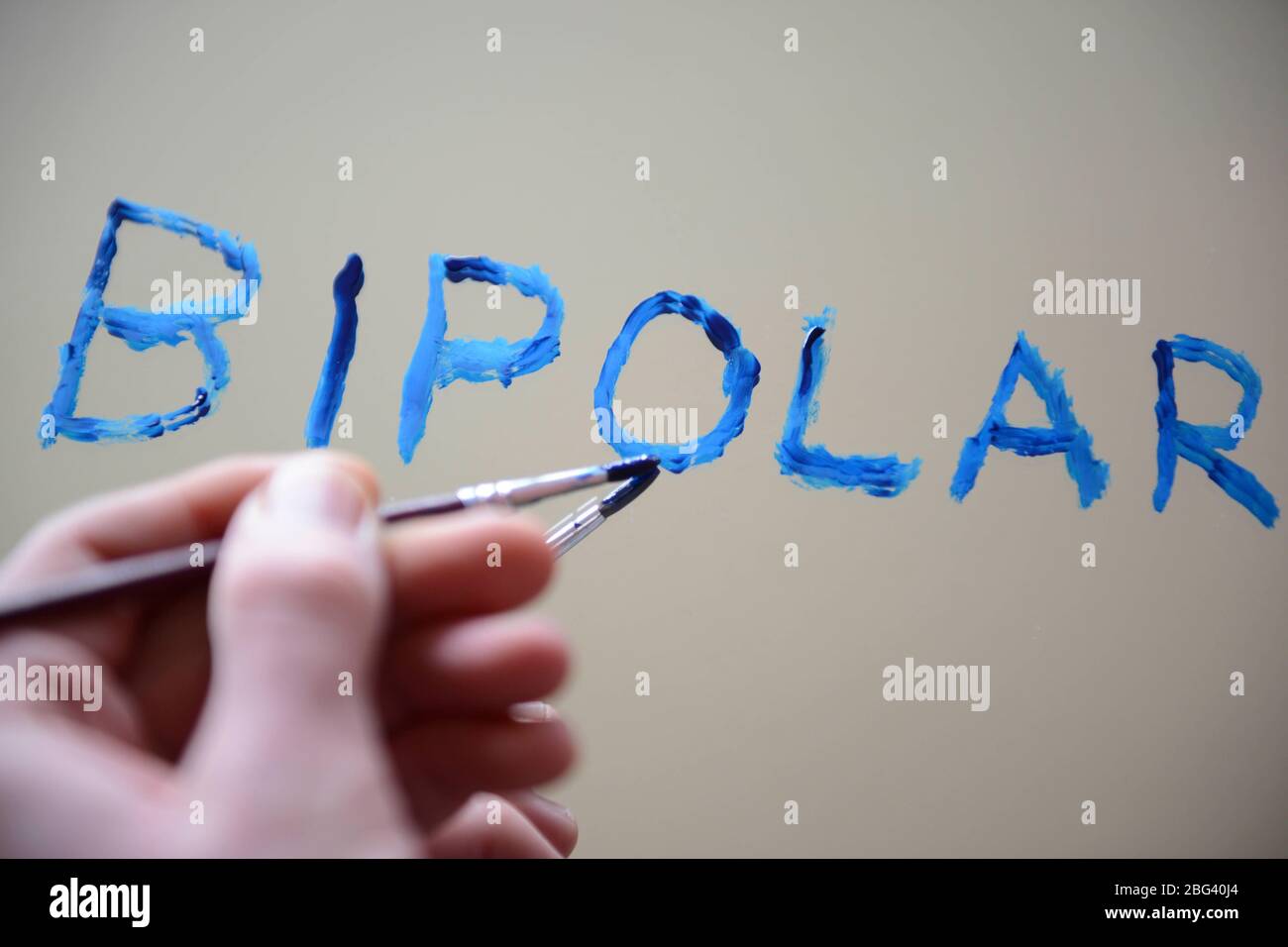 Bipolar geschrieben auf Spiegel mit Farbe Stockfoto
