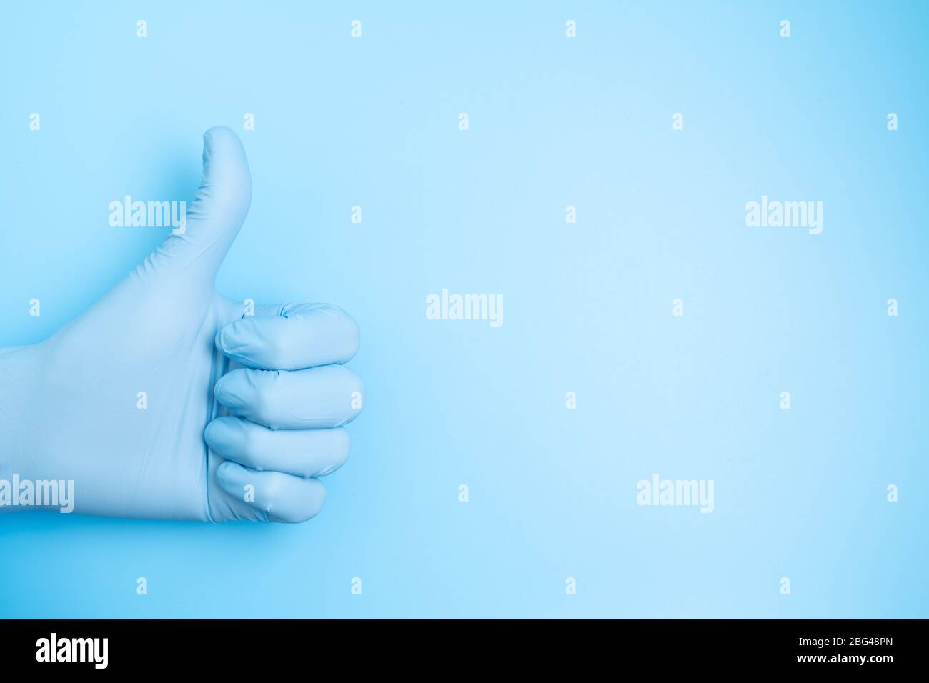 Handhandschuhe Daumen hoch Stockfoto