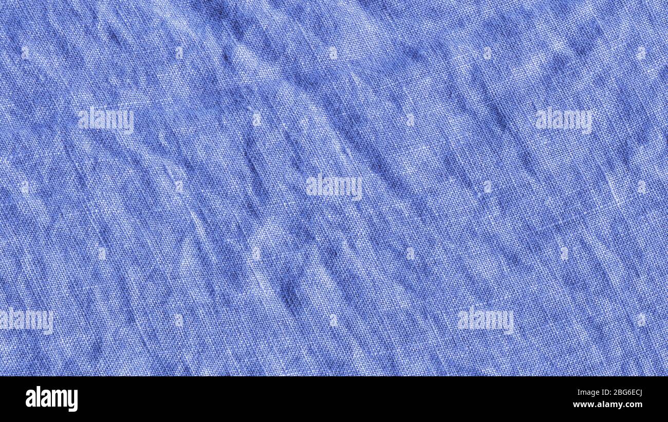 Struktur aus blauem Stoff. Stoff mit natürlicher Textur. Blaue Leinwandtextur Stockfoto