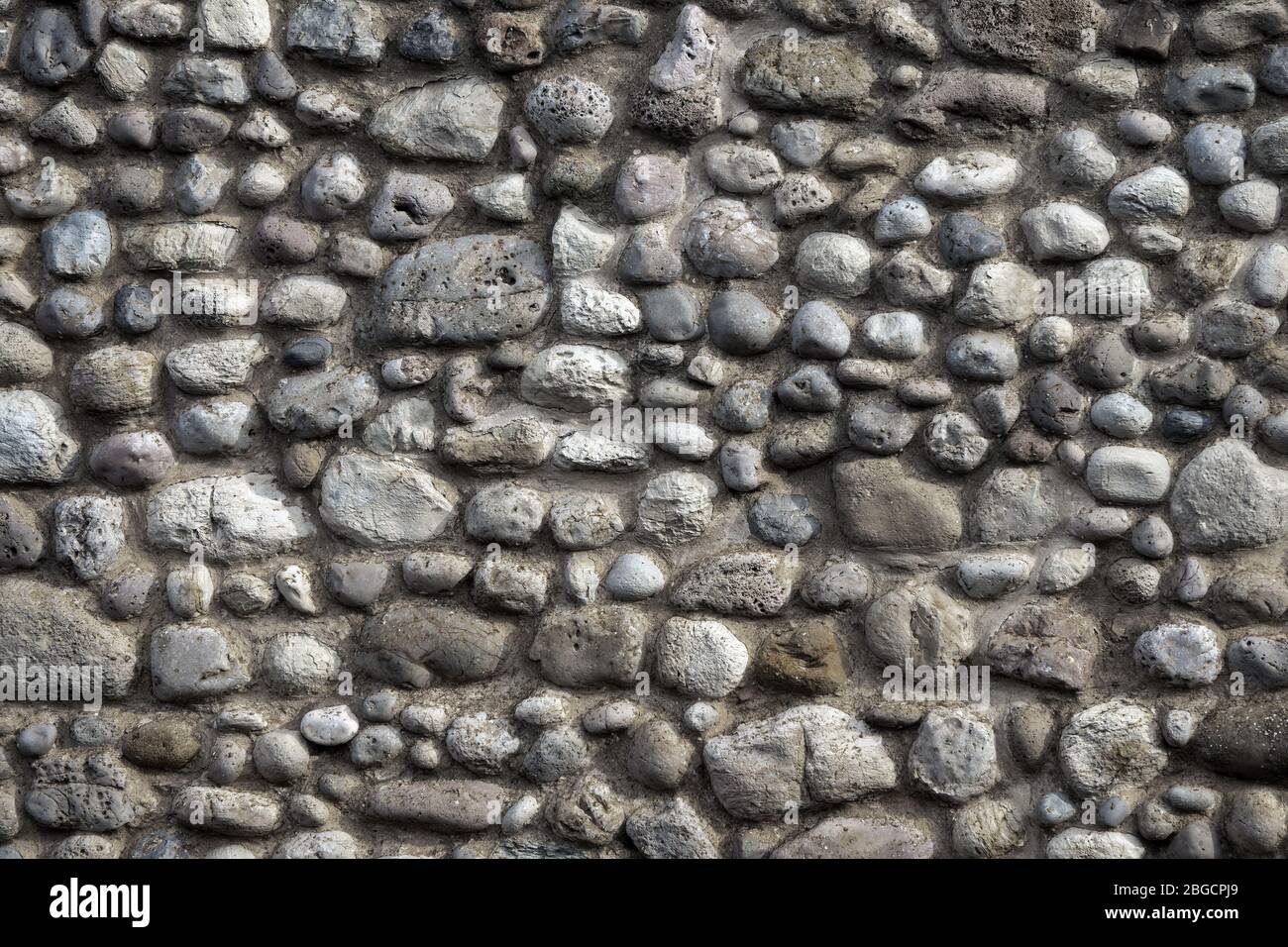 Natursteinmauer Hintergrund Stockfoto