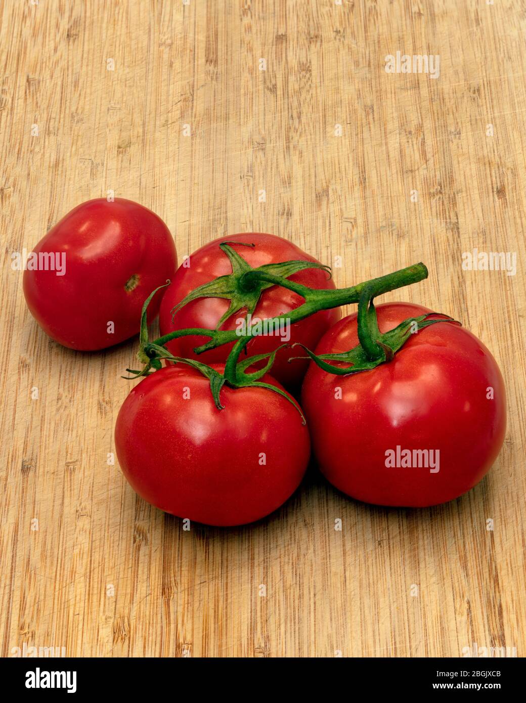 Weinreife Tomaten, von James D Coppinger/Dembinsky Photo Assoc Stockfoto