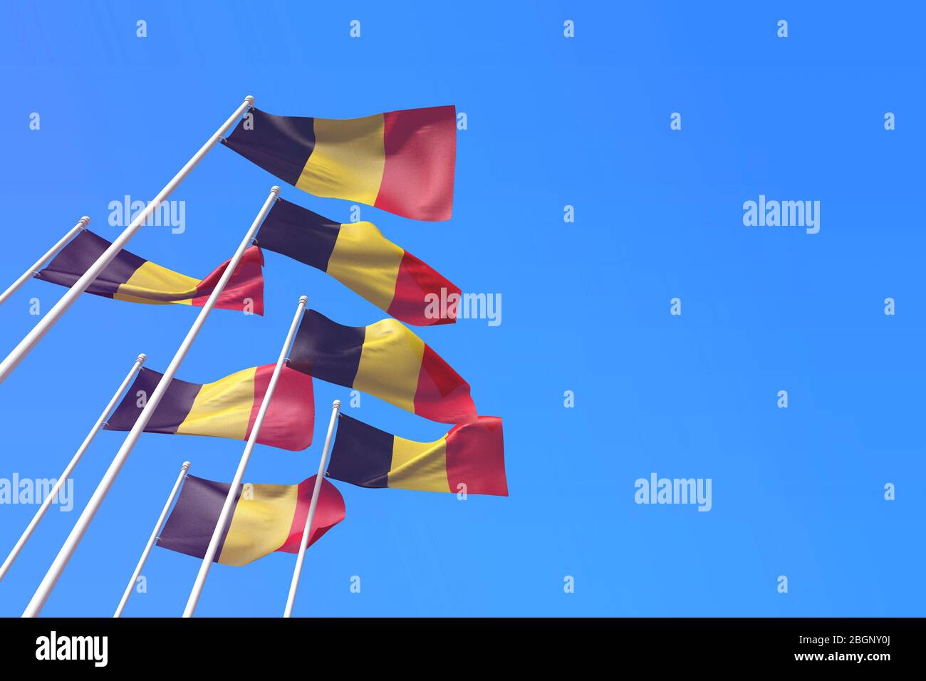 Belgische Flaggen winken im Wind gegen einen blauen Himmel. 3D-Rendering Stockfoto