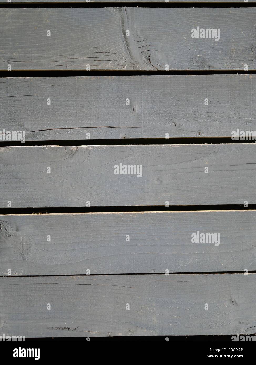 Graue Zaunbretter Stockfoto