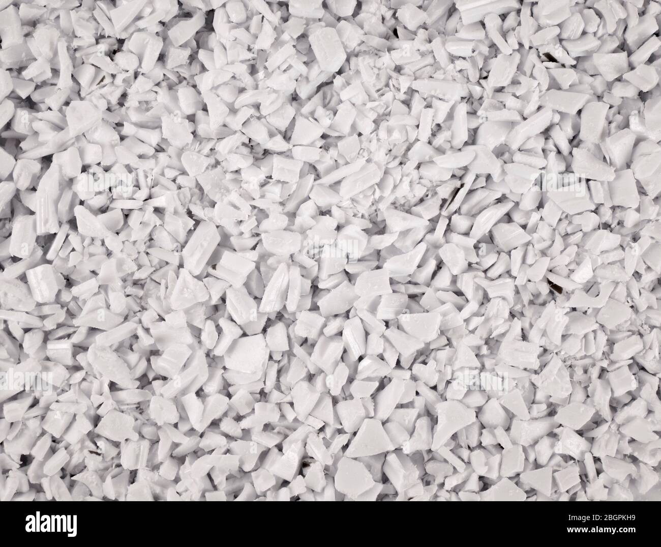 Weiße Schrott Stücke von Kunststoff Produktion Hintergrund Stockfoto