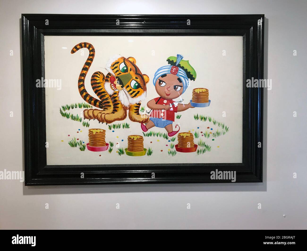 Gerahmte Kunstwerke, die Sambo und Tiger mit Pfannkuchen im Restaurant von Sambo in Santa Barbara, CA, darstellen Stockfoto