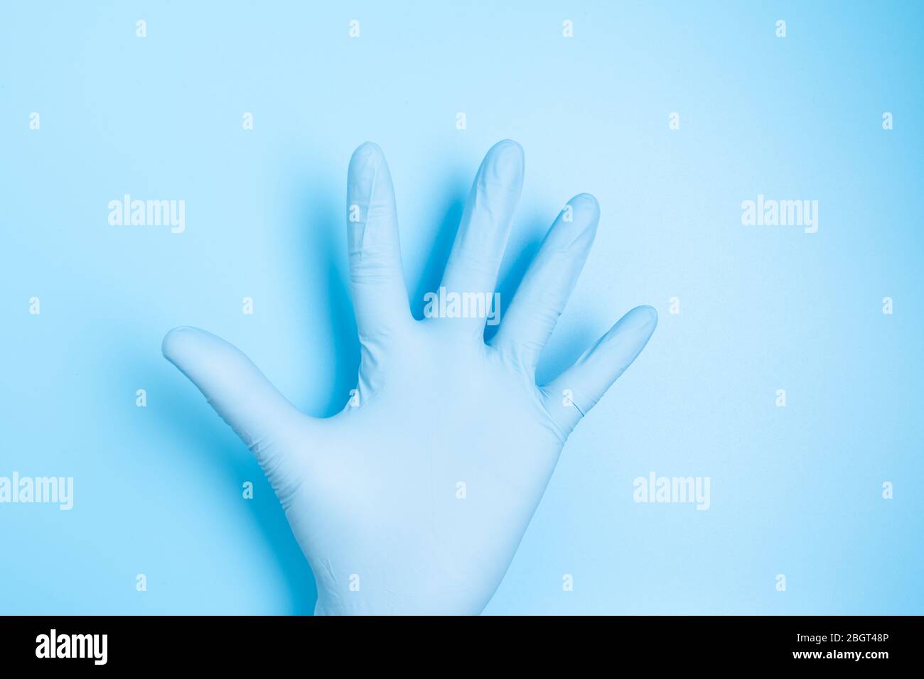 Außenhandschuh aus medizinischem Latex Stockfoto