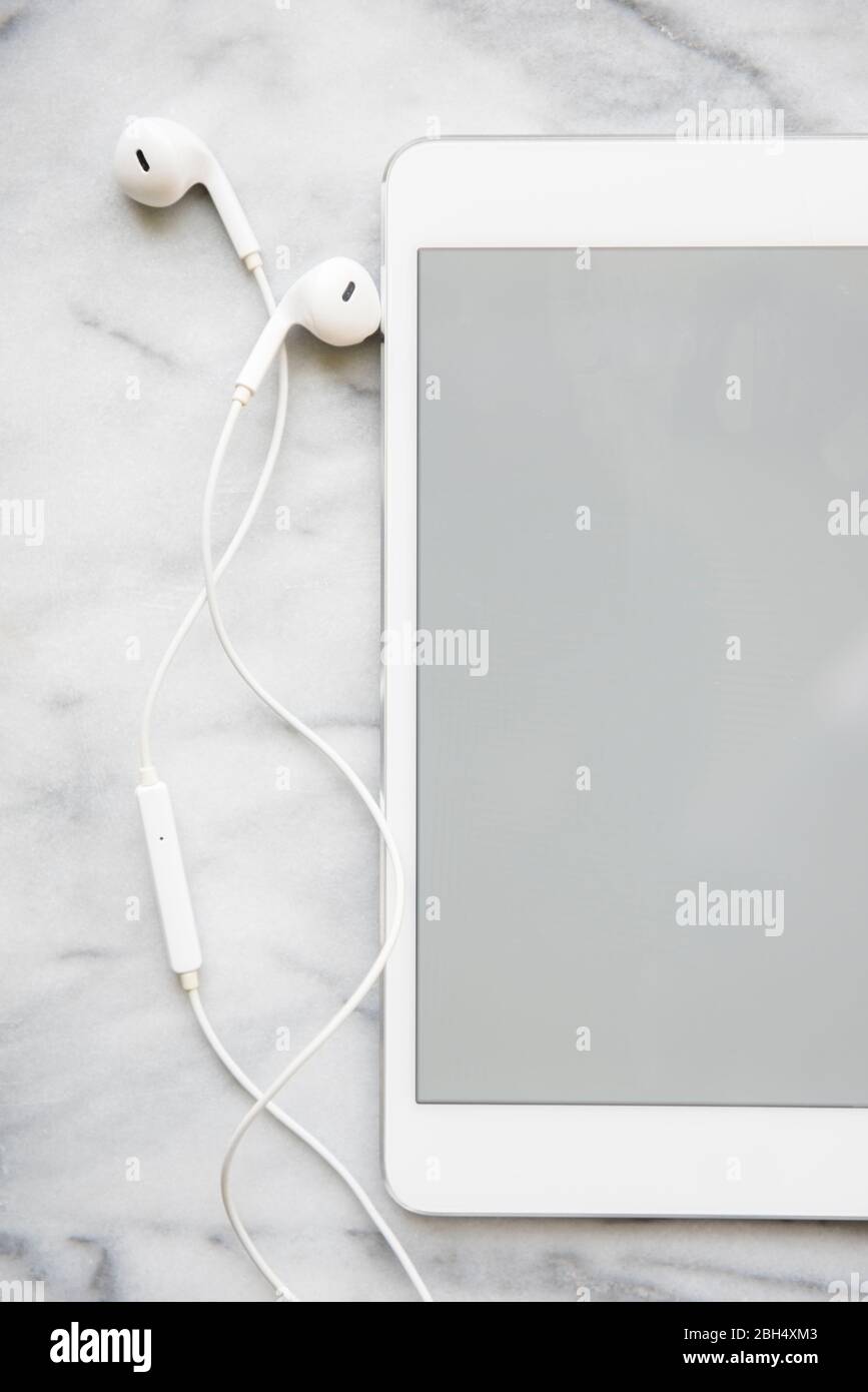Kopfhörer und digitales Tablet Stockfoto