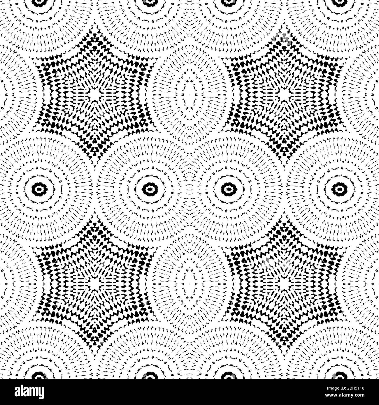 Eine computergenerierte Illustration eines nahtlosen Mandalas mit scharfen Punkten in Schwarz-Weiß-Farben. Stockfoto