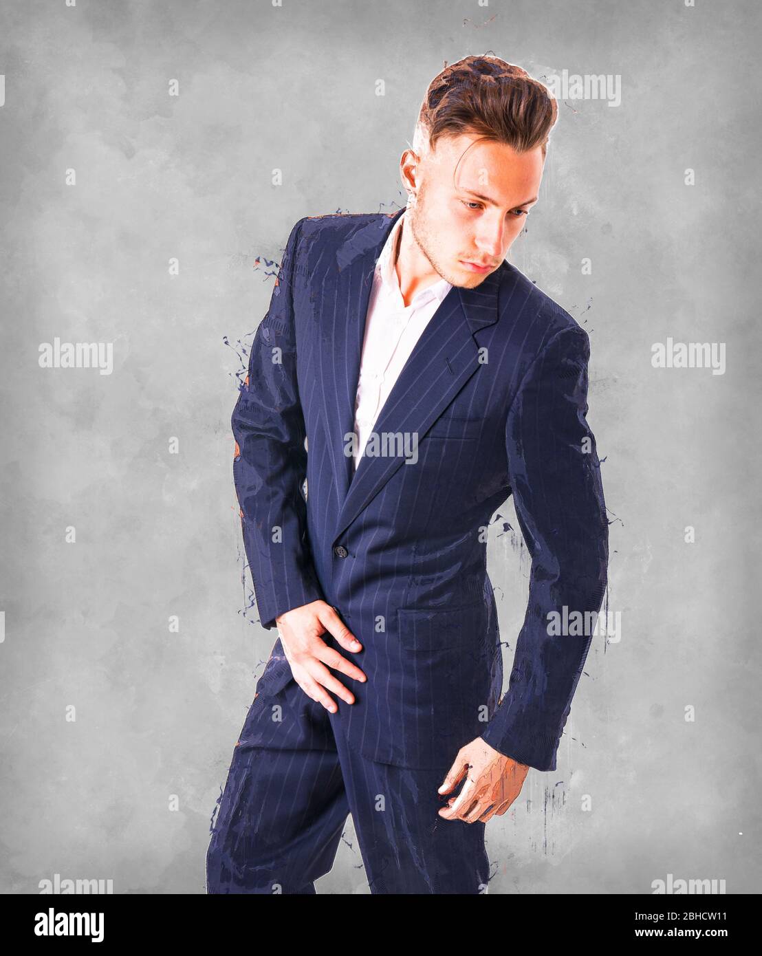 Elegante junge Mann mit Anzug im Studio Stockfoto