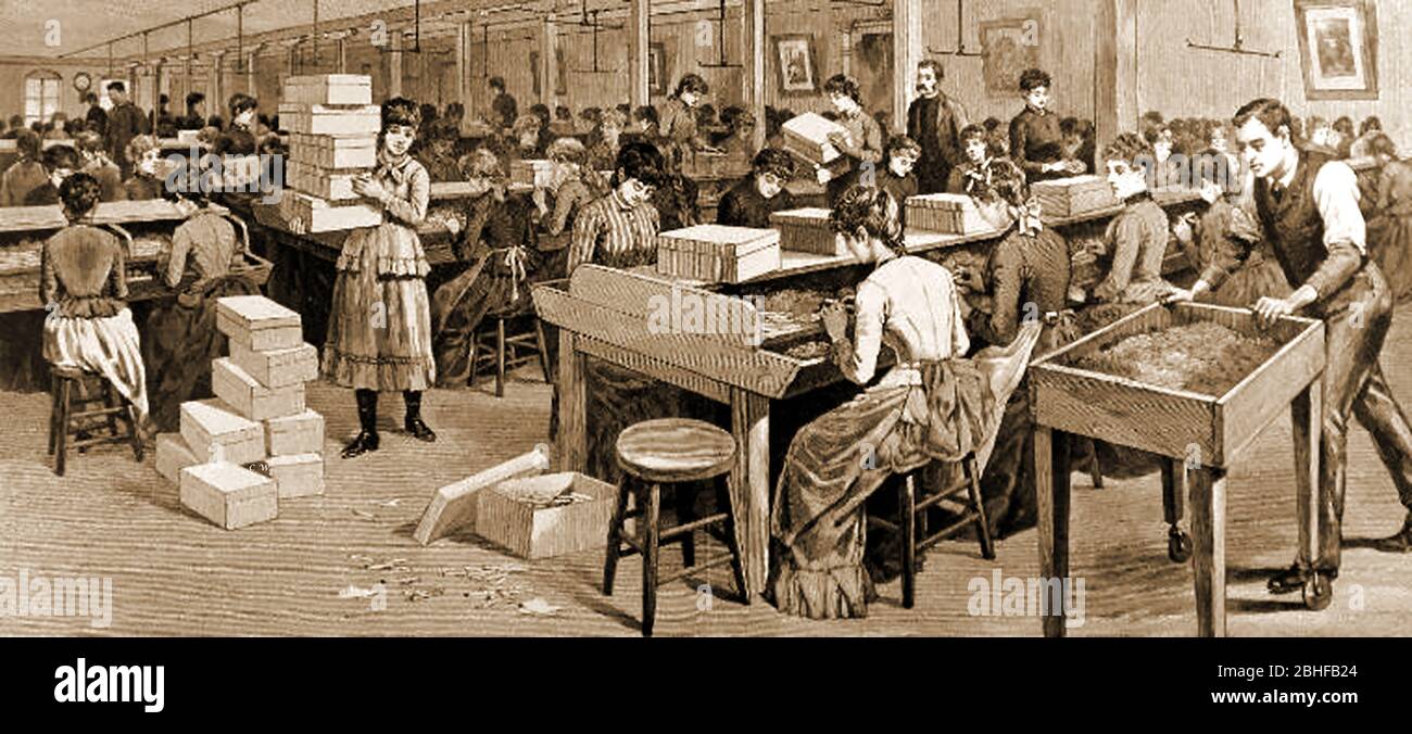 Tabakindustrie im 1800 - Hand rollende Zigarren in einer viktorianischen Fabrik mit der Mehrheit der Fabrikarbeiter, die weiblich sind. Stockfoto