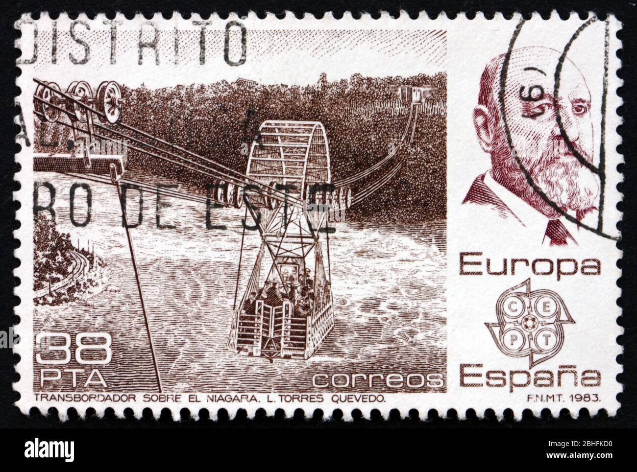 SPANIEN - UM 1983: Eine in Spanien gedruckte Briefmarke zeigt Leonardo Torres Queavedo, spanischer Bauingenieur und Mathematiker, und seine Niagara-spanische Aer Stockfoto