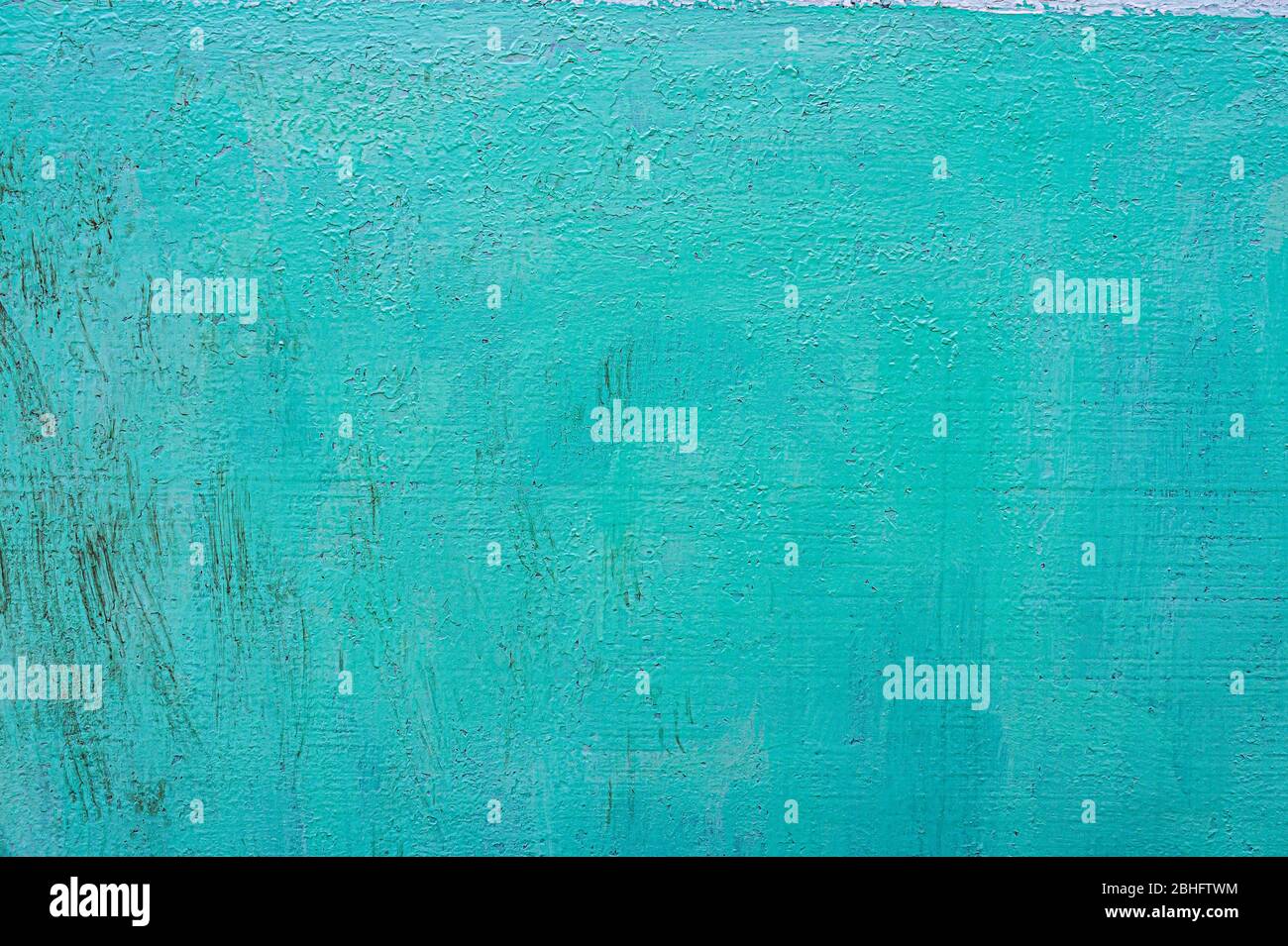 Gesprungene Farbe, viele Schichten, alte blaue Farbe. Schmutzige Textur Stockfoto