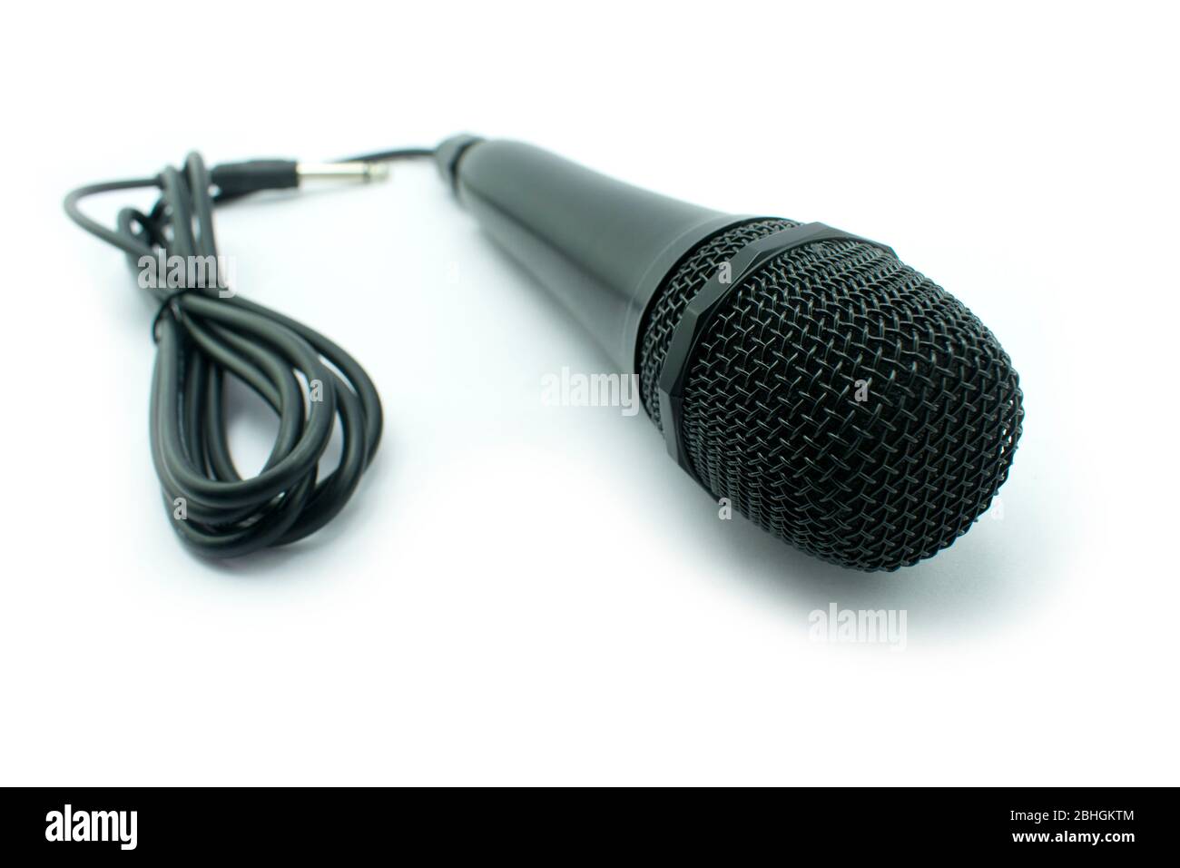 Das Bild von kabelgebundenen schnurlosen Mikrofon Mic DJ singen isoliert auf weiß Stockfoto