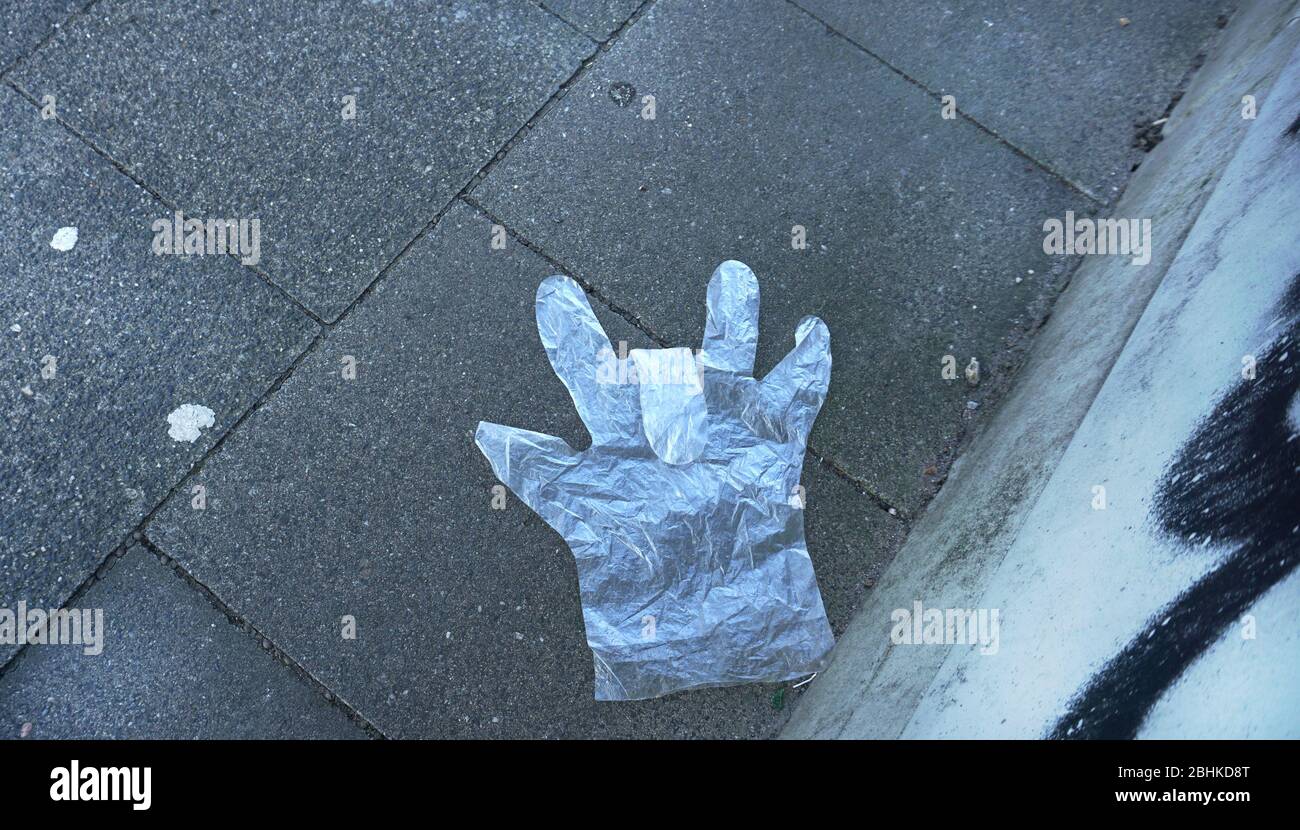 Einweghandschuh ist unterwegs Stockfoto