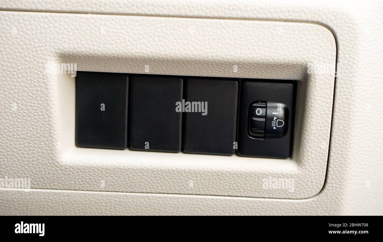 Nebelscheinwerfer-Bedienknöpfe am Fahrzeug Stockfoto