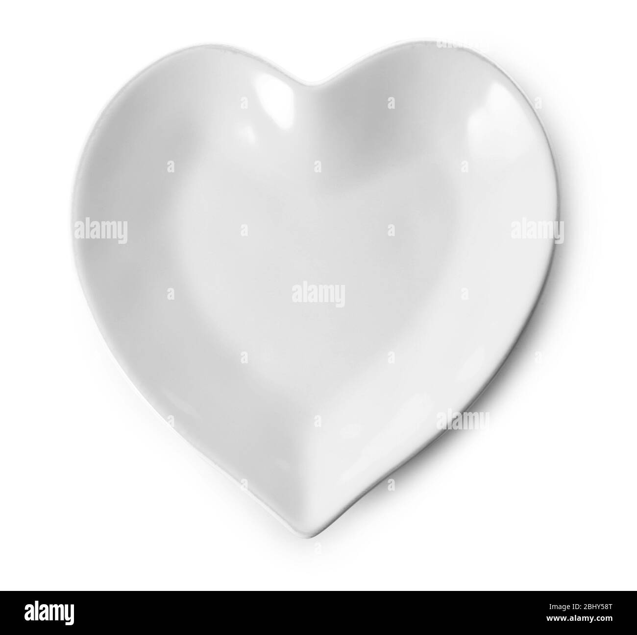 Leeren Teller isoliert auf weiss Stockfoto