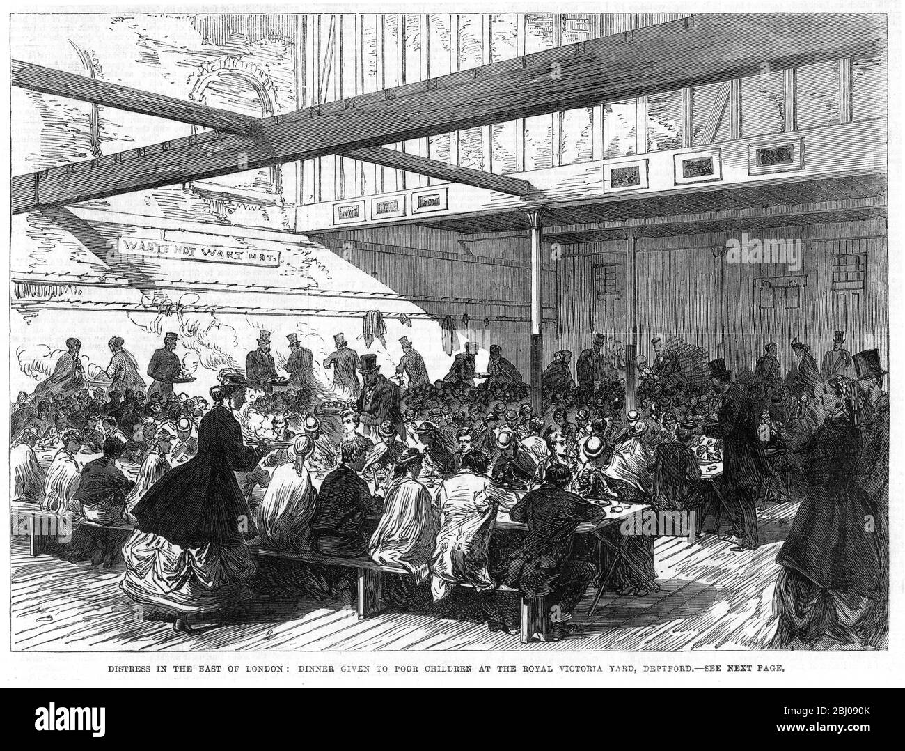 Arme Kinder haben im Royal Victoria Yard, Deptford London, Essen gegeben. Die Not unter den armen Menschen in East London wird durch das kalte Wetter und die erhöhte Arbeitslosigkeit noch verschärft. Mehr als 5000 arme Kinder haben kostenlose Abendessen mit gesammelten Mitteln von denen, die noch in der Arbeit auf dem Hof gegeben. - 9. März 1867 Stockfoto