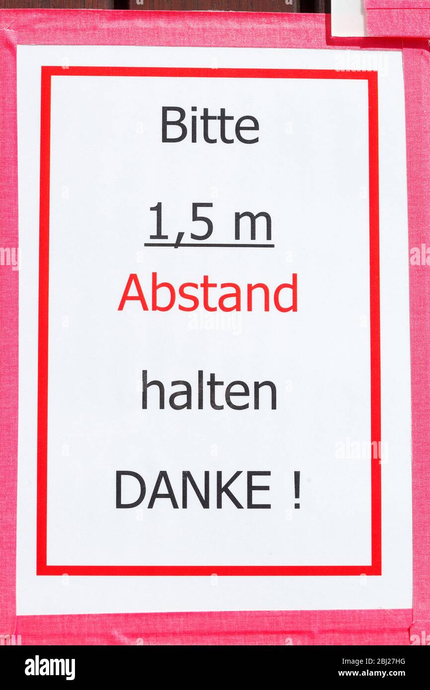 Schild Bitte halten Sie Ihre Distanz, Mindestabstand wegen Corona-Virus, Deutschland, Europa Stockfoto